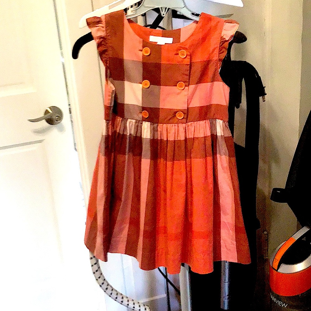 This is a Burberry dress for 6 y.o. There are warmer tones.